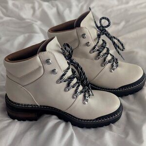 Brand new White short boots with chunky black heel